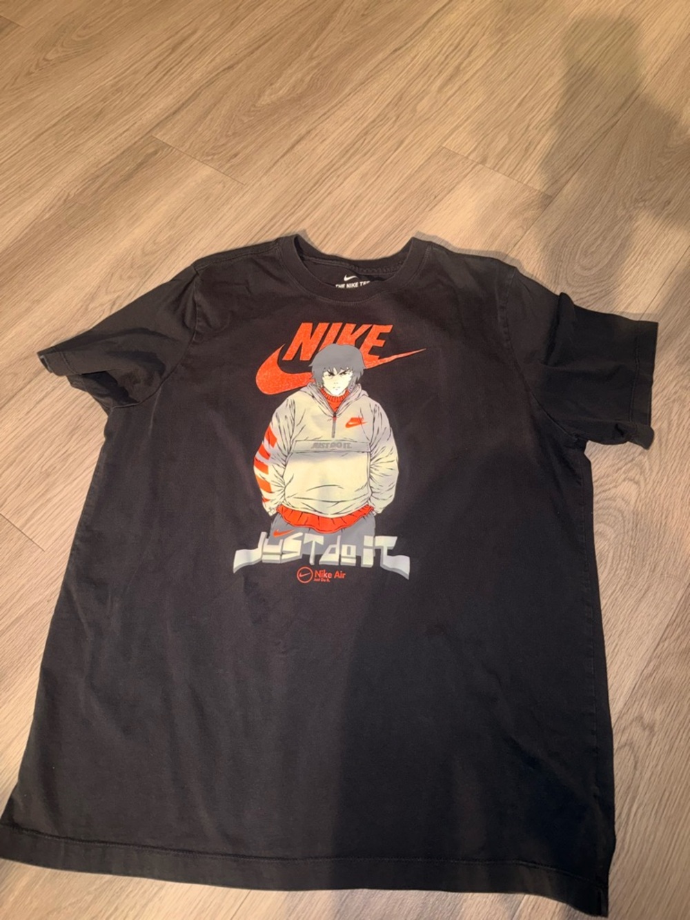 Nike Black Graphic 'Just Do It' Tee with Orange Logo